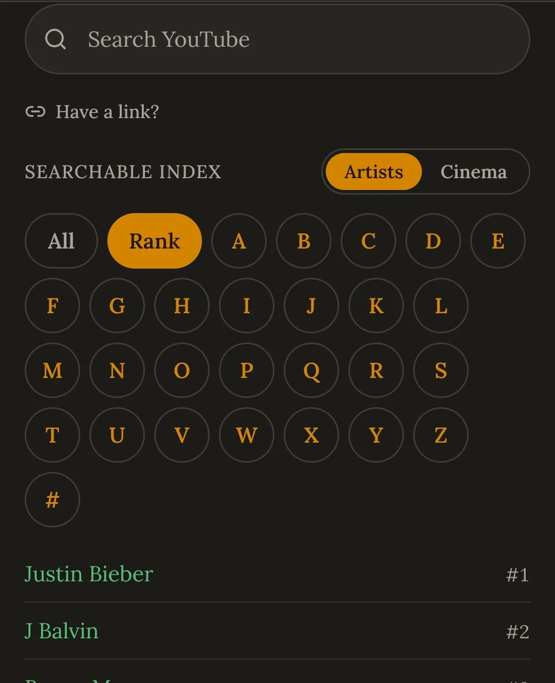 The Add a song screen showing a Search YouTube box above a searchable index of artists, with A to Z filter buttons and a ranked list beginning Justin Bieber, J Balvin.